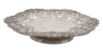 A silver shaped circular vine pattern dessert stand by Atkin Brothers  A silver shaped circular vine