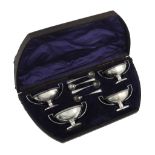 A cased set of four Victorian silver pedestal salts by Henry Wilkinson & Co  A cased set of four