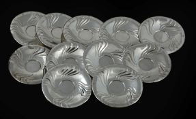 A set of eleven German silver coloured saucers by Lazarus Posen  A set of eleven German silver
