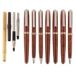Four Italian silver coloured mounted and briarwood fountain pens  Four Italian silver coloured
