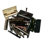 A collection of writing instruments, varied makes  A collection of writing instruments,   varied