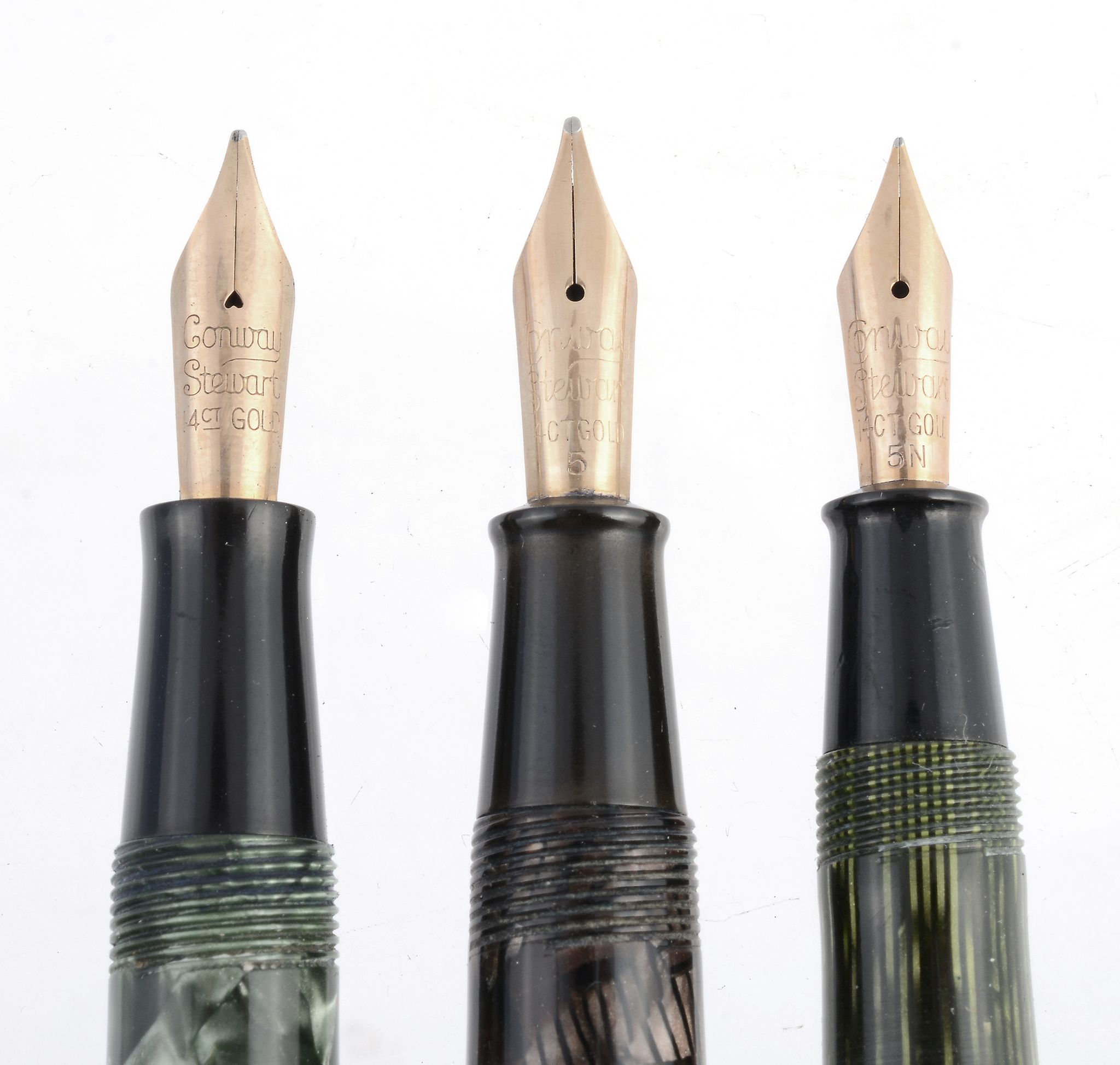 Conway Stewart, 36, a green striated fountain pen, the nib stamped 14ct and 5N  Conway Stewart, - Image 2 of 2