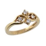 An 18ct diamond dress ring, set with four round brilliant cut diamonds to a...  An 18ct diamond
