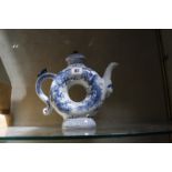 A modern Chinese blue and white teapot, ring shaped, 25cm high