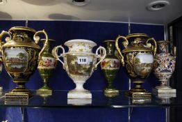 A pair of Derby style two-handled vases, 'Buckingham House' (missing covers, gilt worn), 22cm high