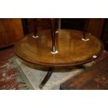 A modern leather inlaid circular low table 107cm diameter