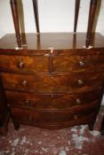 An early 19th century mahogany bowfront chest of two short and three long drawers 106cm wide