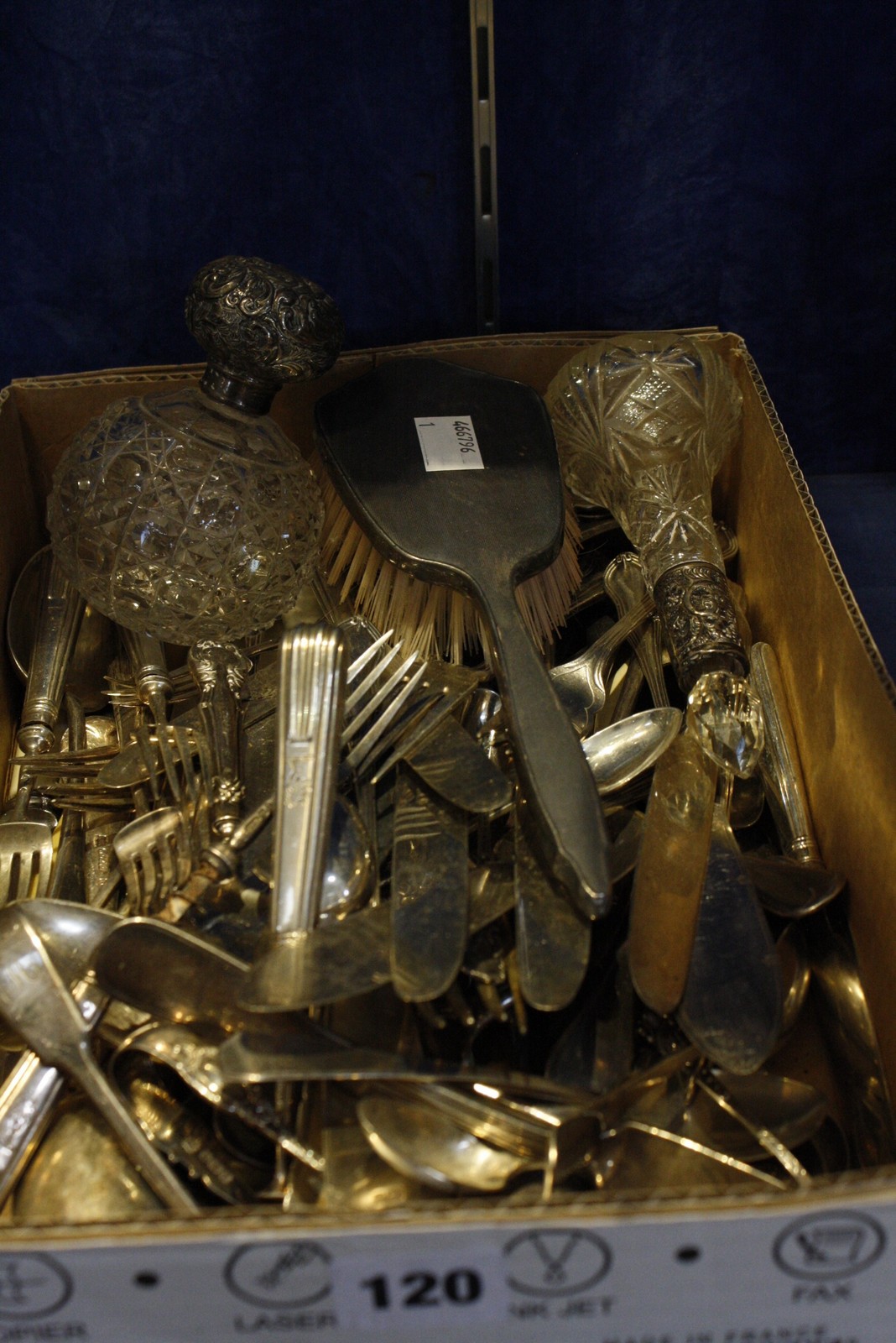 A small collection of silver flatware and plated cutlery, including: a Victorian fiddle and thread