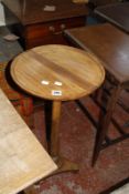 A 19th Century fruitwood and mahogany occasional table on turned column and triform base 76cm high