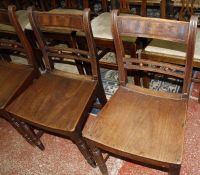 A set of six 19th Century country Sheraton design dining chairs with wooden panelled seats