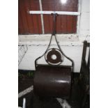 A cast iron lawn roller made by Barford & Perkins of Peterborough, with later handle. Best Bid