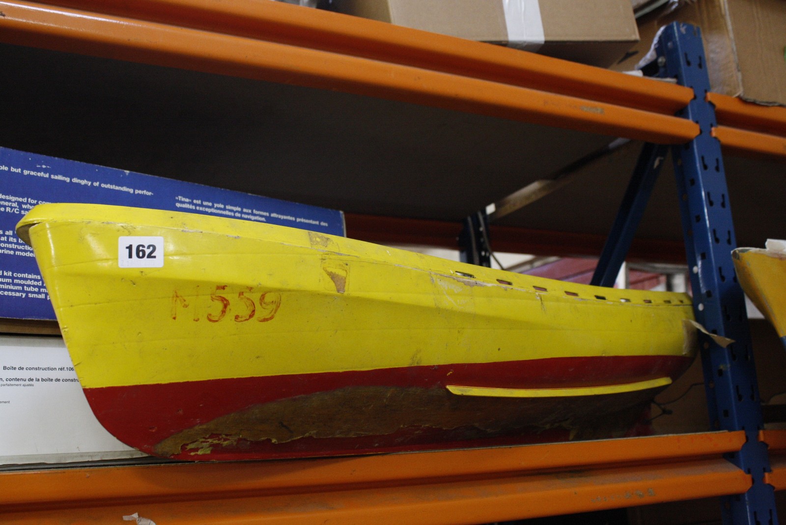 A TINA RC model sailing dinghy, boxed, a Robbe 'Jollie' model sailing dinghy, boxed, a model boat (