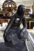 A modern composition sculpture of a seated girl, with Chinese seal mark, 39cm high approx.