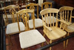 A pair of beech kitchen armchairs, together with a set of four pine chairs