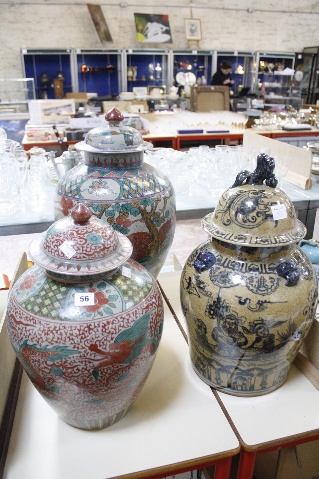 Three modern Chinese vases with covers, baluster shaped, the tallest 60cm high approx. (chips in