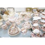 A quantity of 19th Century part services to include a pink lustre teapot and four matching