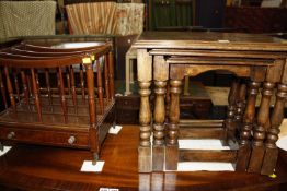A reproduction canterbury and a nest of three oak tables, together with a mahogany occasional table