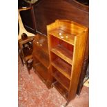A George III mahogany two tier washstand, an Edwardian mahogany open bookcase, a modern occasional