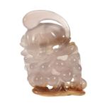 A Chinese agate carving of a rodent eating grapes, 6cm long