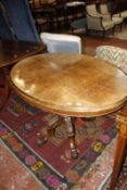A Victorian burr walnut oval low table 108cm wide