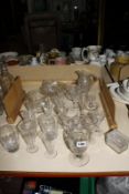 A quantity of 18th/ 19th Century glassware to include Regency cream jugs, wines and other items