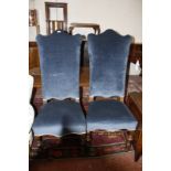 Two similar walnut and upholstered high back chairs, early 18th century and later