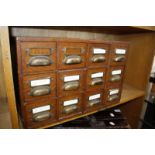 * An oak twelve drawer chest, 48.5cm wide