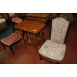 Victorian ebonized nursing chair, an Edwardian nursing chair, spindle back chair and a lamp table.