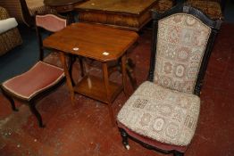 Victorian ebonized nursing chair, an Edwardian nursing chair, spindle back chair and a lamp table.