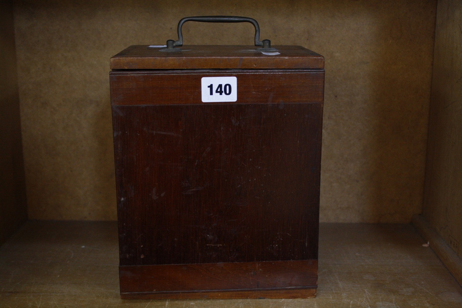 An Early 20th Century Brass Microscope signed on one of the lenses R & J Beck, in mahogany case 23cm