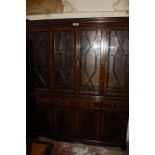 A George III style glazed, mahogany finished bookcase.152cm wide.