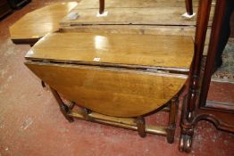 An oak gateleg dining table with a frieze drawer 18th century 98cm wide