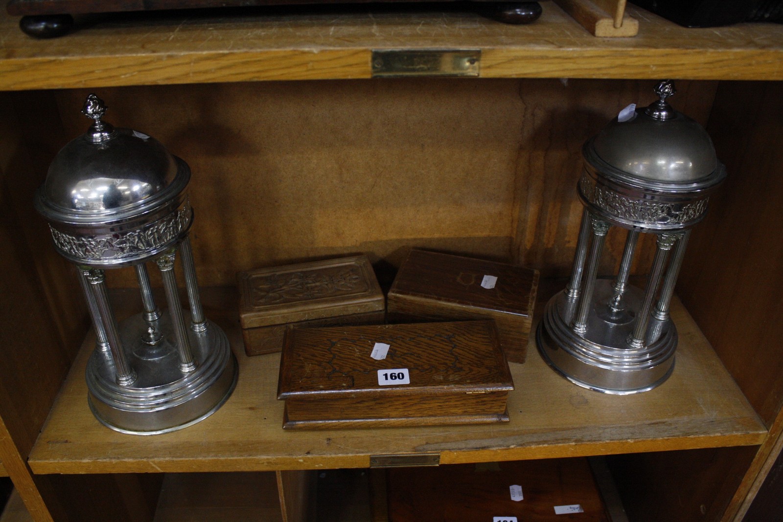 A late 19th/early 20th century Continental music box in a carved wooden case, two other small