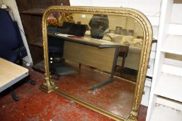 A Victorian style gilt decorated overmantel mirror 110cm high, 140cm wide
