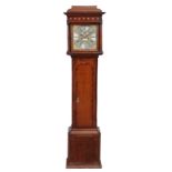 A George III mahogany banded oak eight-day longcase clock, the four pillar rack and bell striking