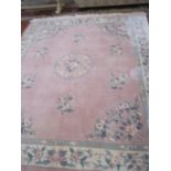 A Chinese cut pile pink ground carpet, approximately 8ft x 10ft Best Bid