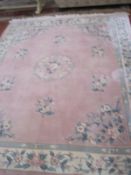 A Chinese cut pile pink ground carpet, approximately 8ft x 10ft Best Bid