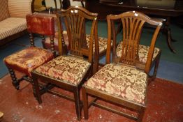 Four Georgian style dining chairs and a pair leather covered hall chairs on bobbin supports.