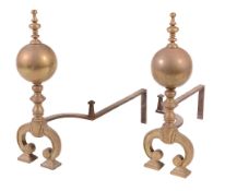 A pair of brass and wrought iron mounted andirons, early 18th century  A pair of brass and wrought