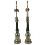 A pair of reverse decorated glass and gilt metal mounted table lamps  A pair of reverse decorated