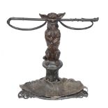 A Victorian cast iron dog stick stand , second half 19th century  A Victorian cast iron dog stick