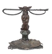 A Victorian cast iron dog stick stand , second half 19th century  A Victorian cast iron dog stick