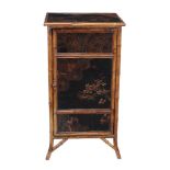 A lacquered and bamboo cabinet , late 19th century  A lacquered and bamboo cabinet  , late 19th