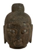 A large Chinese grey stone head of a Buddha , Ming Dynasty or later, 34cm high  A large Chinese grey