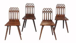 A set of four oak Gothic dining chairs, 19th century  A set of four oak Gothic dining chairs,   19th