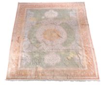 A Persian silk carpet , approximately 407 x 300cm  A Persian silk carpet  ,  approximately 407 x