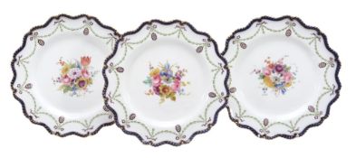 Three Royal Worcester dessert plates signed by E  Three Royal Worcester dessert plates signed by  E.