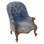 A Victorian walnut and button upholstered armchair, circa 1870  A Victorian walnut and button