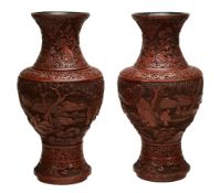 A large pair of Chinese cinnabar lacquer vases, 19th century  A large pair of Chinese cinnabar