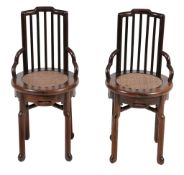 A pair of Chinese or South East Asian hardwood child's chairs, 20th century  A pair of Chinese or